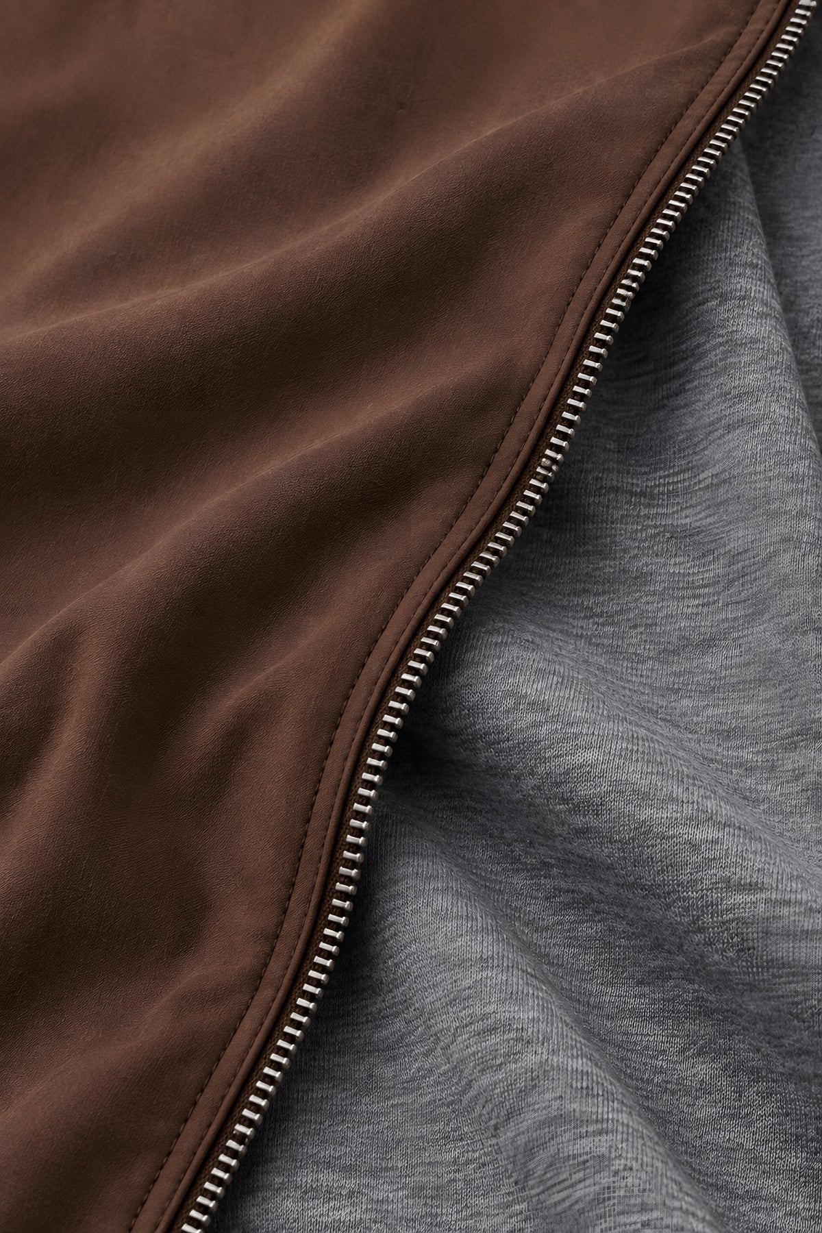 Gilet réversible Refend marron et gris, macro de la matière — visuel généré par IA