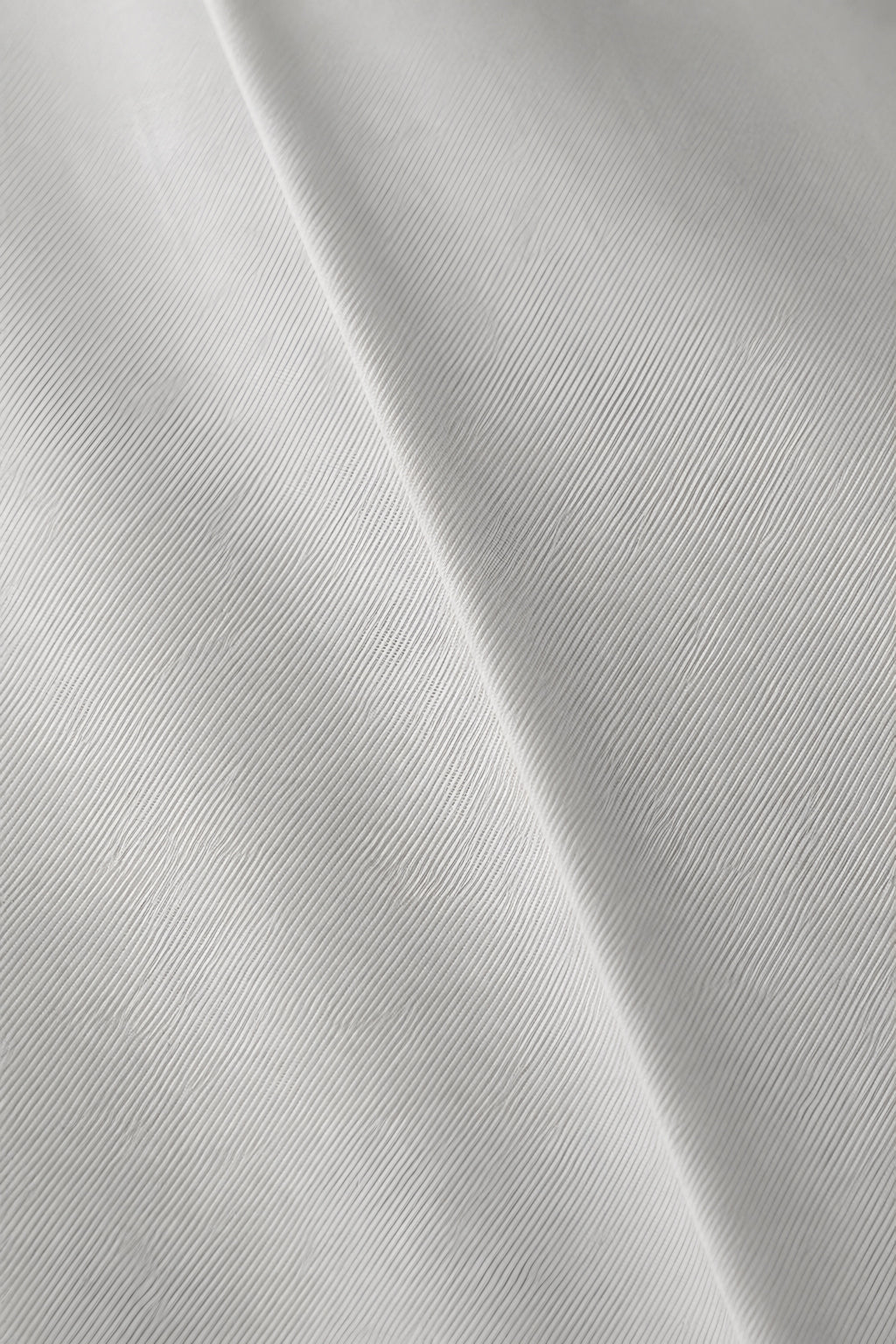 Pantalon droit Appui gris paris, macro de la matière — visuel généré par IA