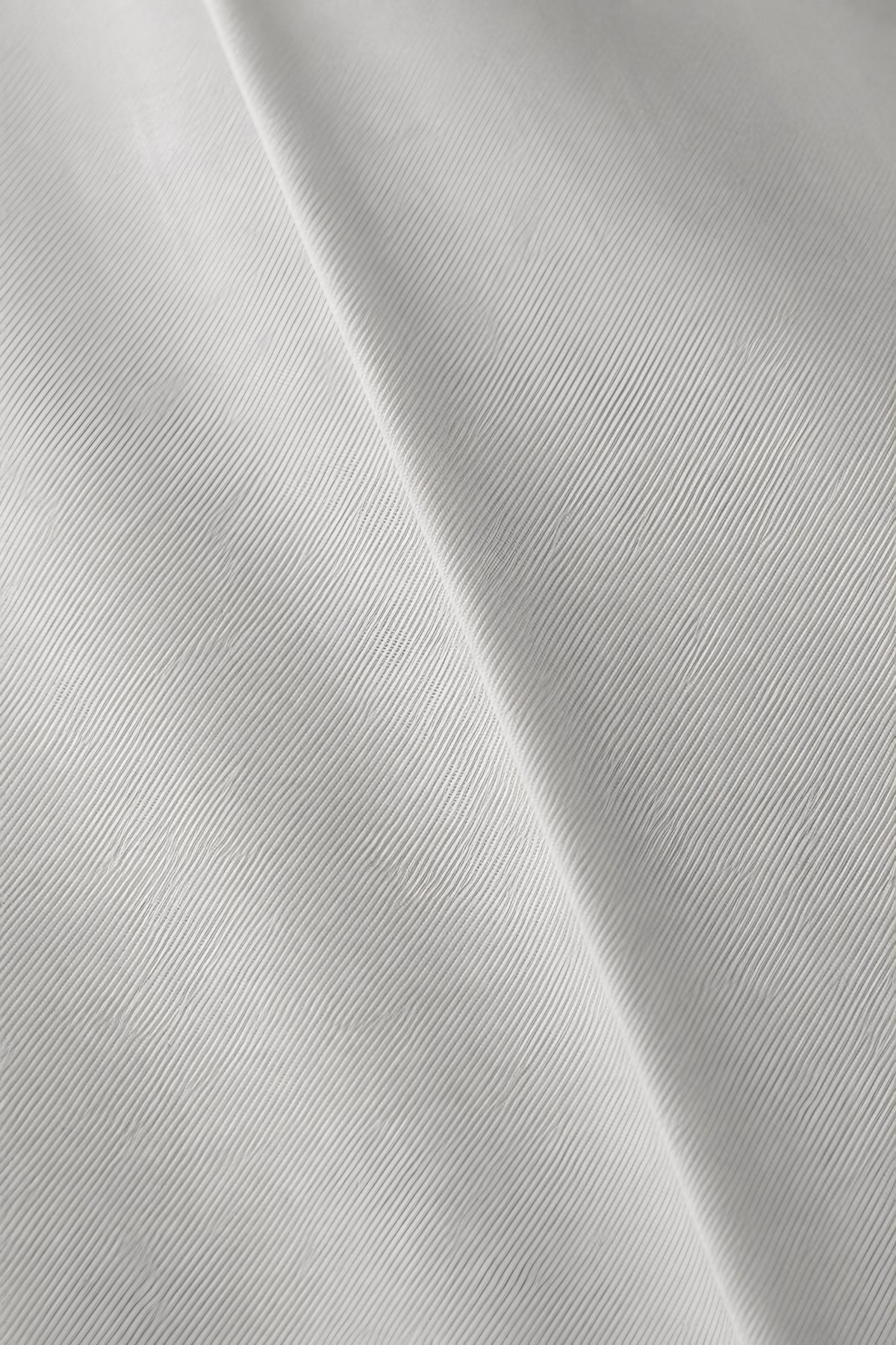 Pantalon droit Appui gris paris, macro de la matière — visuel généré par IA