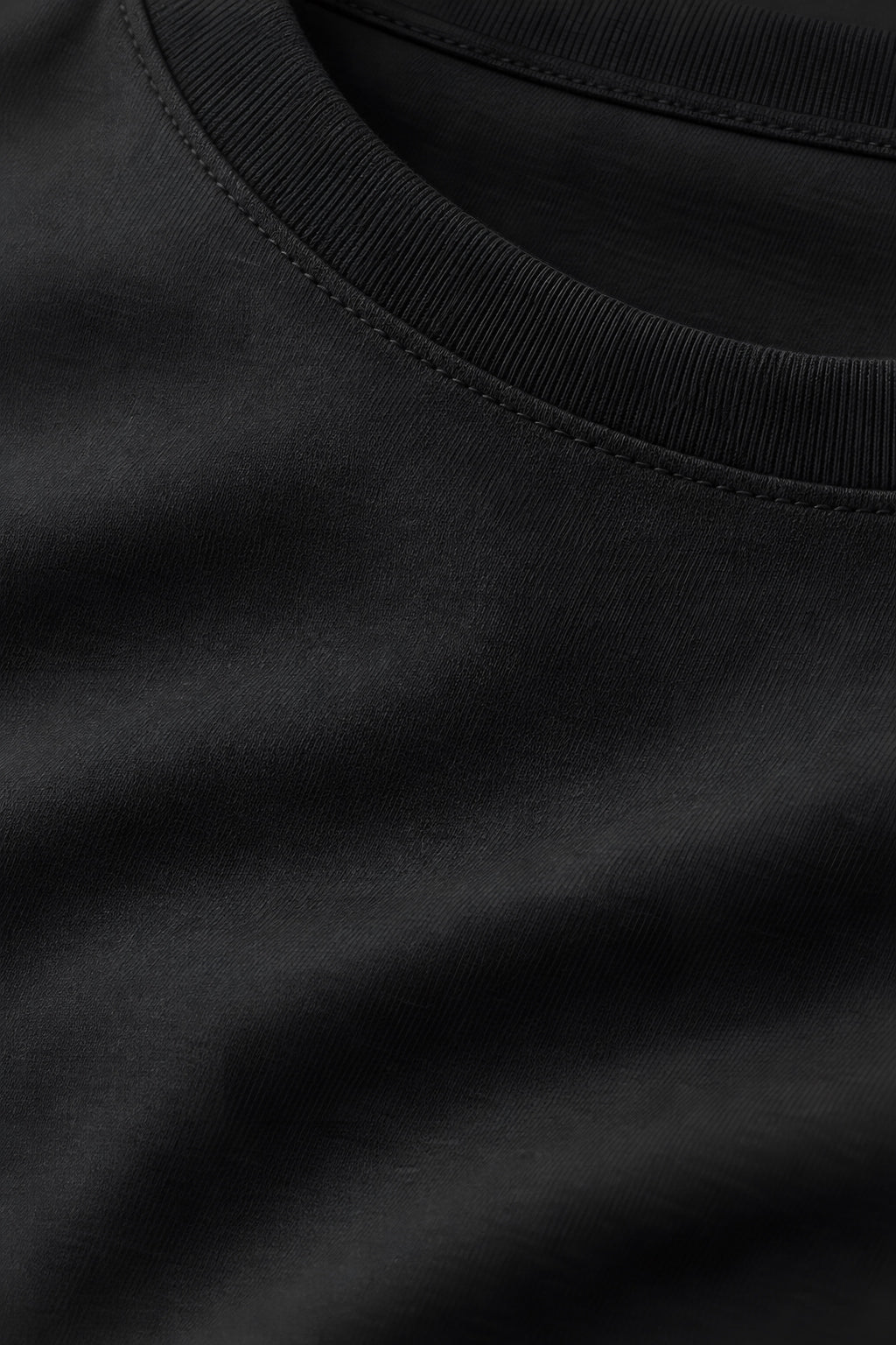 T-shirt manches longues Allège noir, macro de la matière — visuel généré par IA