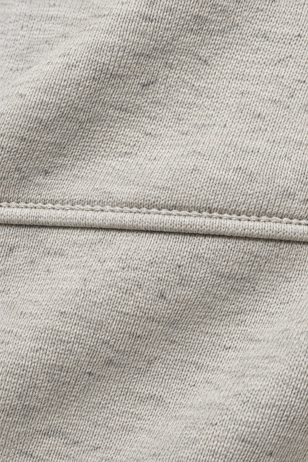 Veste zippée Palier écru, macro de la matière — visuel généré par IA
